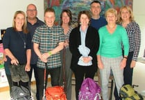 Carers tackle Three Peaks Challenge for residential home garden