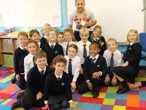 Paralympic triathlon champion inspires primary school children