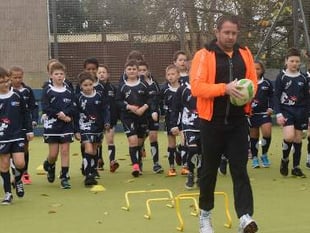 Children form an orderly line-out for Wales’ best