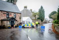 Village reopens after forensic search in murder probe