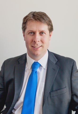 Headshot of Cllr Richard John, leader of Tories on MCC