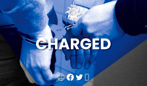 Officer charged with image and data offences