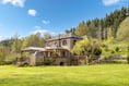 Former mill for sale comes with its own water wheel and woodlands 