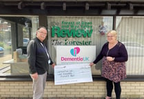 Forester and Review team present cheque to Dementia Uk's Ken Vowles