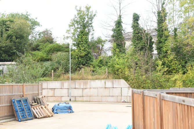 The wall within the school grounds where it was claimed a man was seen running across the top
