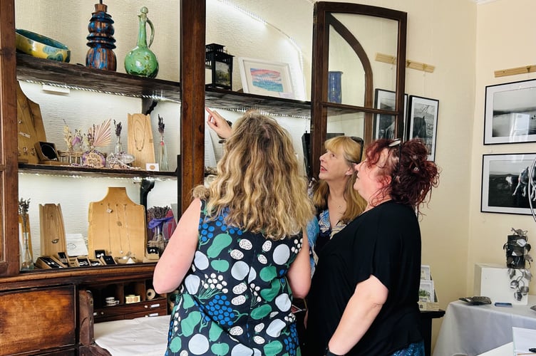 Ann Sumner and Beth McIntyre meeting with Emma Bevan-Henderson, Chair of the Abergavenny Art Festival meeting at the Makers Crafts Gallery in Abergavenny