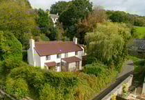 Period cottage for sale comes with "woodland wonderland" 