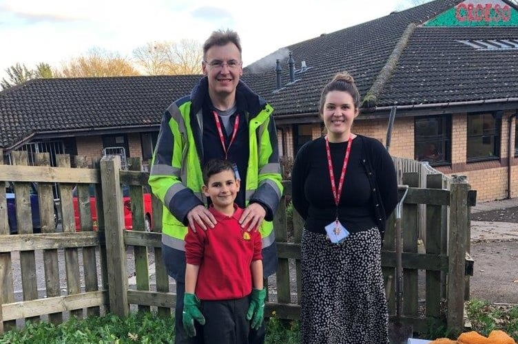 Rotarian Guy Wilson with Miss Wilmott and Serafim Kulyk pupil