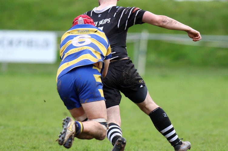 Kester Mobbs-Morgan makes a tackle