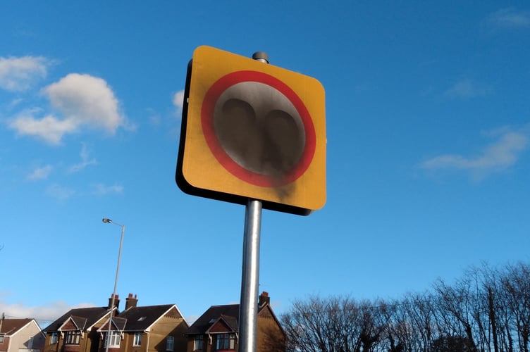 Damaged 20mph signs