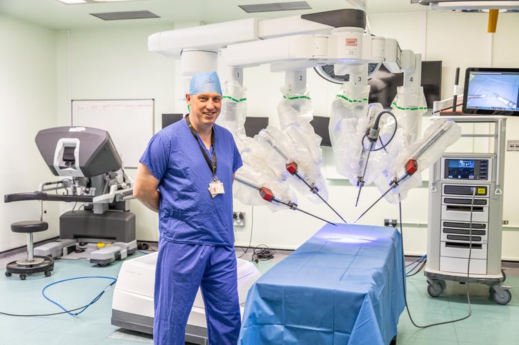 Dr Jim Wilson with the Da Vinci Robot.