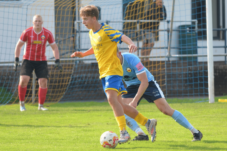 Monmouth Town secured the upset of the Welsh Cup first round beating Newport City 2-0