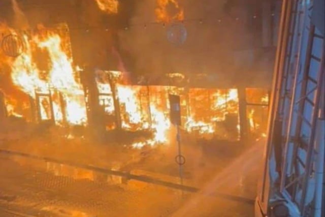 Fire fighters battle to save historic town centre shops in Abergavenny