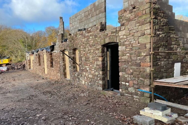 Councillors have reversed their opposition to 'restoring' the Bushes farmhouse