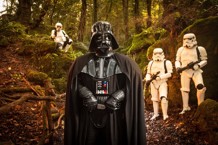 FILE PHOTO - Star Wars characters promote 'Star Wars: Episode VII The Force Awakens' in the Forest of Dean. Photo released December 12 2024. Researchers have begun studying the environmental impacts of Star Wars location shooting - over fears it disrupted a famous woodland.Puzzlewood, in the Forest of Dean, was an important filming location for Star Wars 'The Force Awakens' in 2014.If you were one of the many Star Wars fans who caught sight of the film crews descending on the Forest of Deanâs ancient Puzzlewood for iconic then an Open University research academic wants to hear from you.Dr Rebecca Harrison works in the OUâs Film and Media department and is conducting a study called the âEnvironmental Impact of Filmmaking (EIF)â using Star Wars, its film props and locations as the theme.