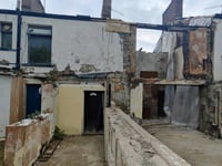 Repair green light for explosion-hit house