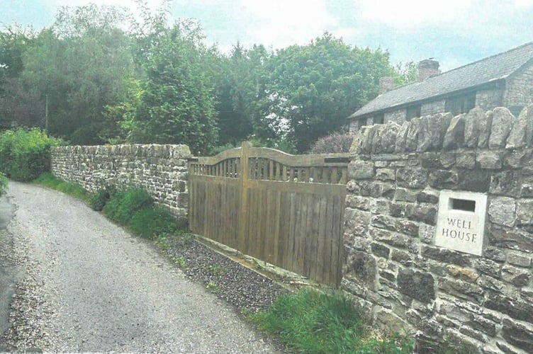 The wooden gates that replaced metal ones