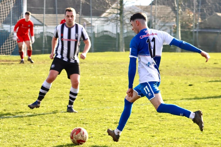 A Chepstow player tries his luck from distance