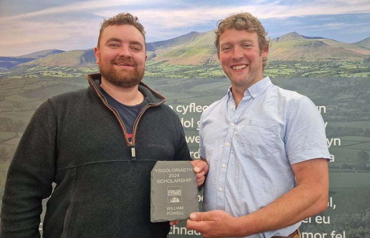 2024 Scholar William Powell receives his award from William Evans, HCC Scholarship Chair