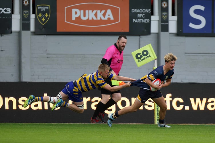 Jack Churches stops an Old Boys attack