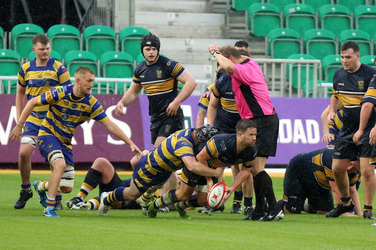 Adam Roberts forces an opponent to lose the ball