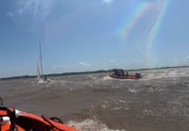 Two saved by local emergency services as catamaran capsizes