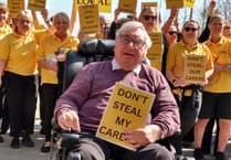Carers' contract protest sparks review