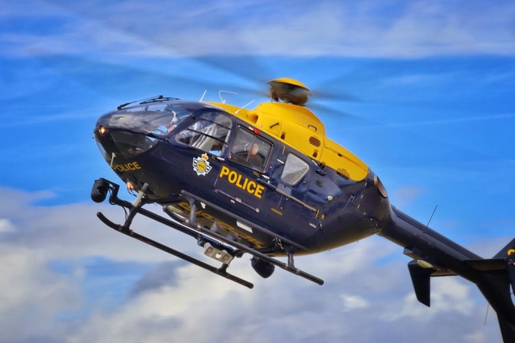 A National Police Air Service helicopter was seen continuing the search near Monmouth for a missing woman today