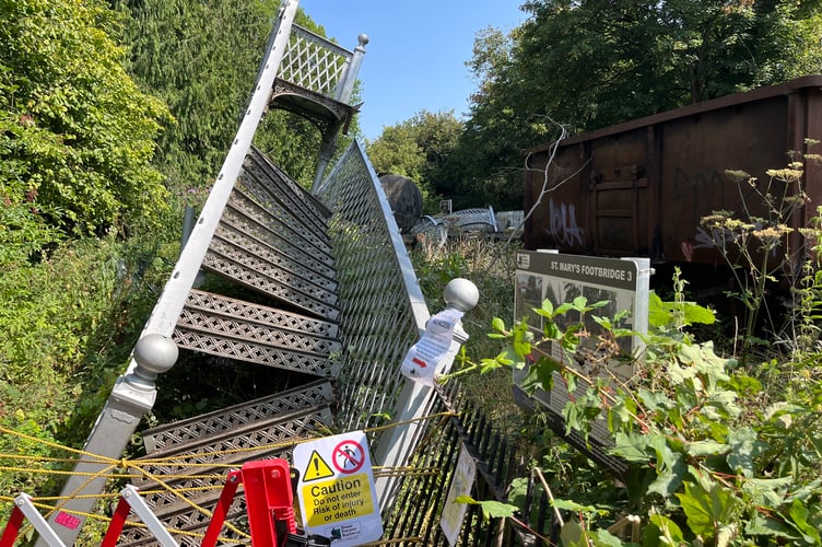 The listed iron bridge at St Mary's Halt was extensively damaged in the collison.