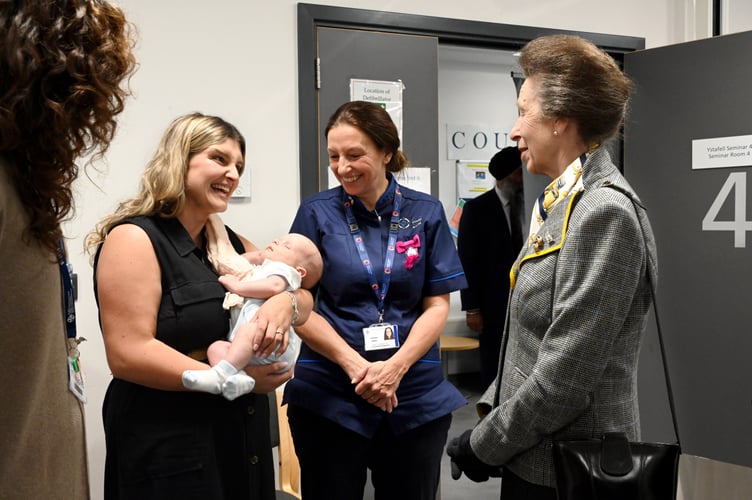 HRH The Princess Royal with Elisia Rogers, Trustee of BABI Group (left) and Consultant Midwife Emma Mills (middle)