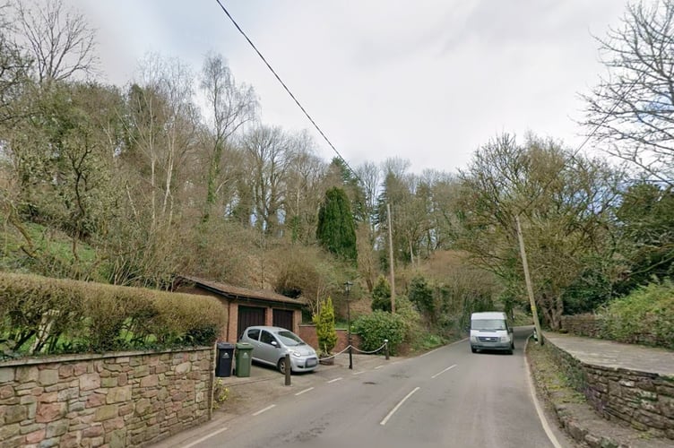 The house would have been built into the hillside behind the property on the left. 
