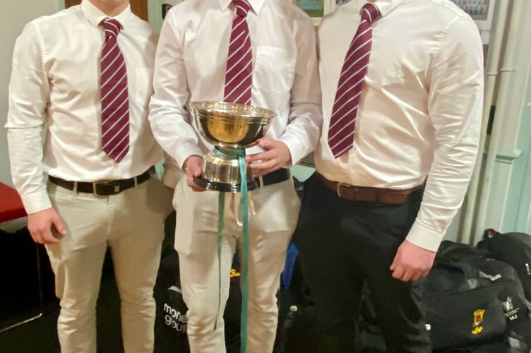 Tryscorer Ollie Scriven (left) with Logan Woskett (centre) and Harry Whelan (right) and the Eddie Butler Bowl