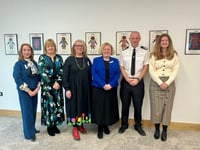 Commissioner launches exhibition on violence against women
