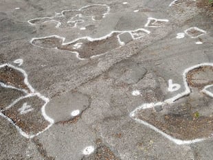 More set to be spent
on fixing county roads