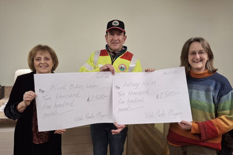  Stuart Kramer, (Blood Bikes Wales) and Kathryn Clarke, (right) (for Anthony Nolan charity) receiving cheques from Julie McGowan, Usk Panto Players (left)