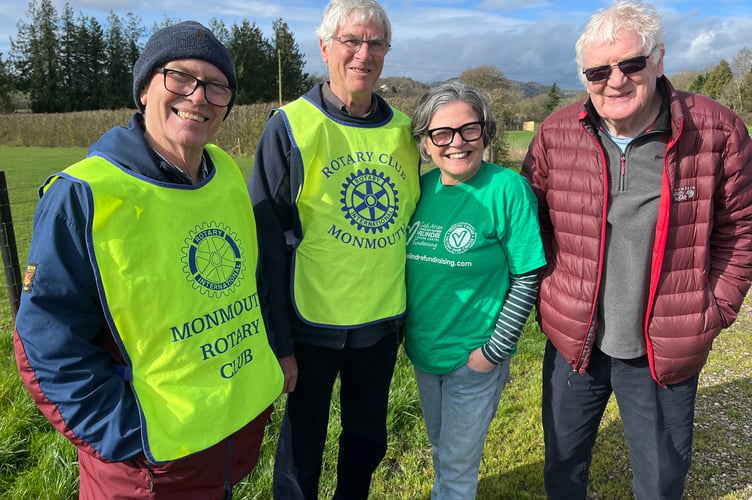 Norman and Angharad are pictured centre with from the left Tom Clarke and Roger Finn