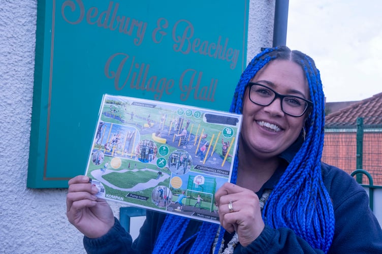 Cllr Justine Burgess with a sample of the sort of equipment that could be installed at Buttington Road.