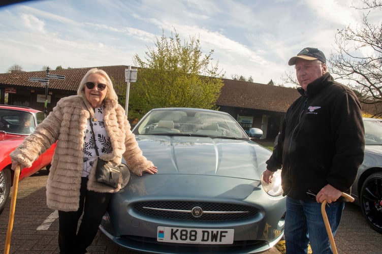 Ruth and David Fisher  with their Jaguar XK8.