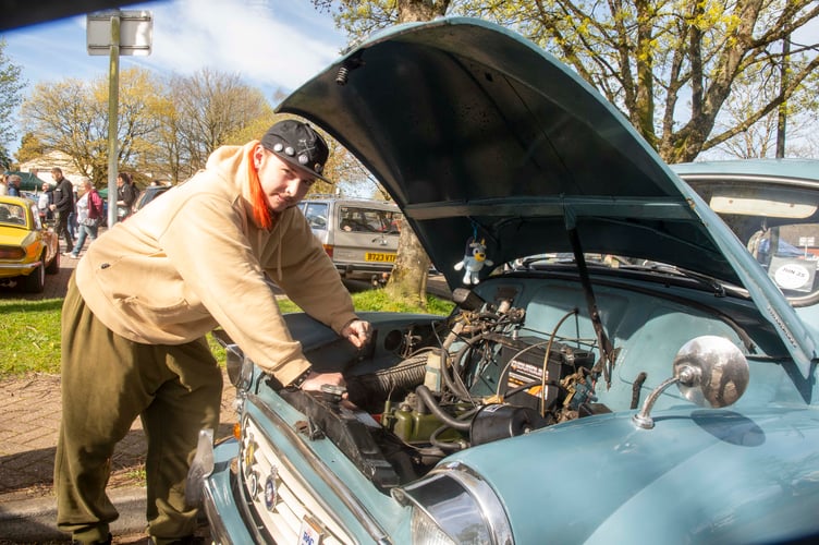 David Caswell with a 1961 Morris Minor in Clipper Blue.
